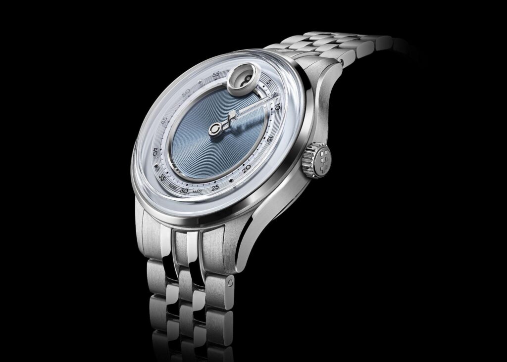 The C1 Jump Hour Mk V, powered by Christopher Ward's JJ01 module. The same in-house complication that, years later, would supply the energy-management architecture for the Bel Canto's chime.
