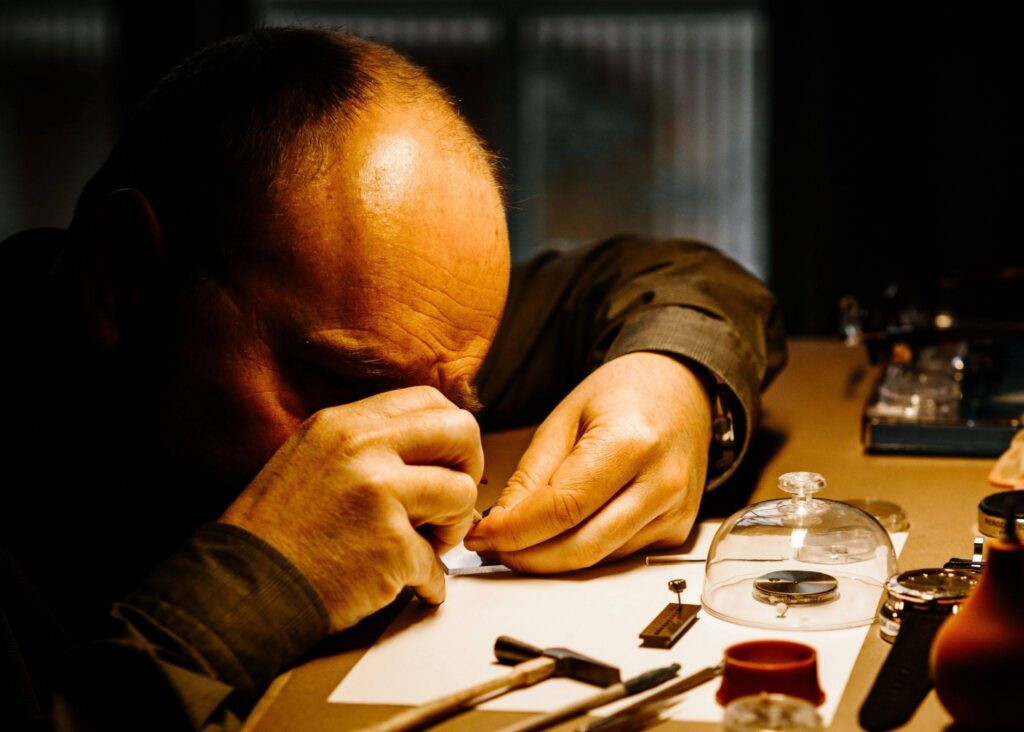 Patrik Sjögren at the workbench in Linköping. The service-watchmaker training he completed in 2007 still informs every GoS design.