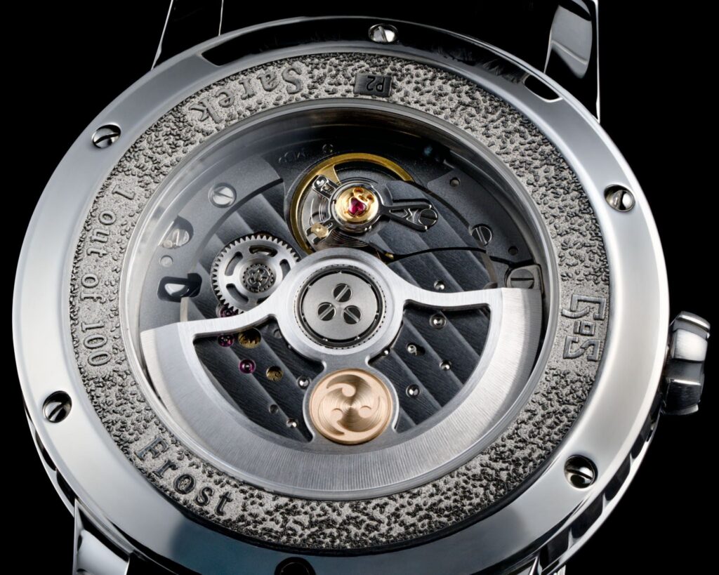 The Sarek Frost caseback. The movement is visible through the sapphire window, with the limitation engraved around the perimeter: one out of one hundred.